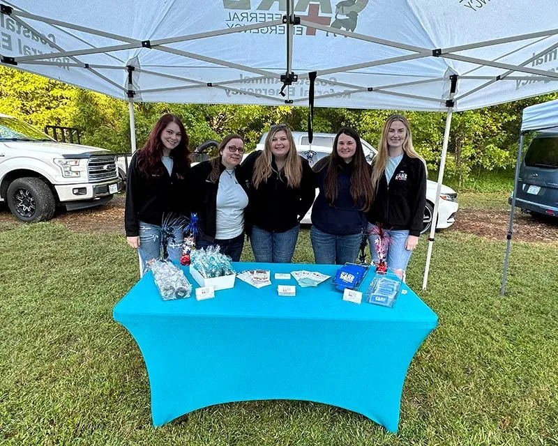 The CARE team at a community event in Williamsburg, VA
